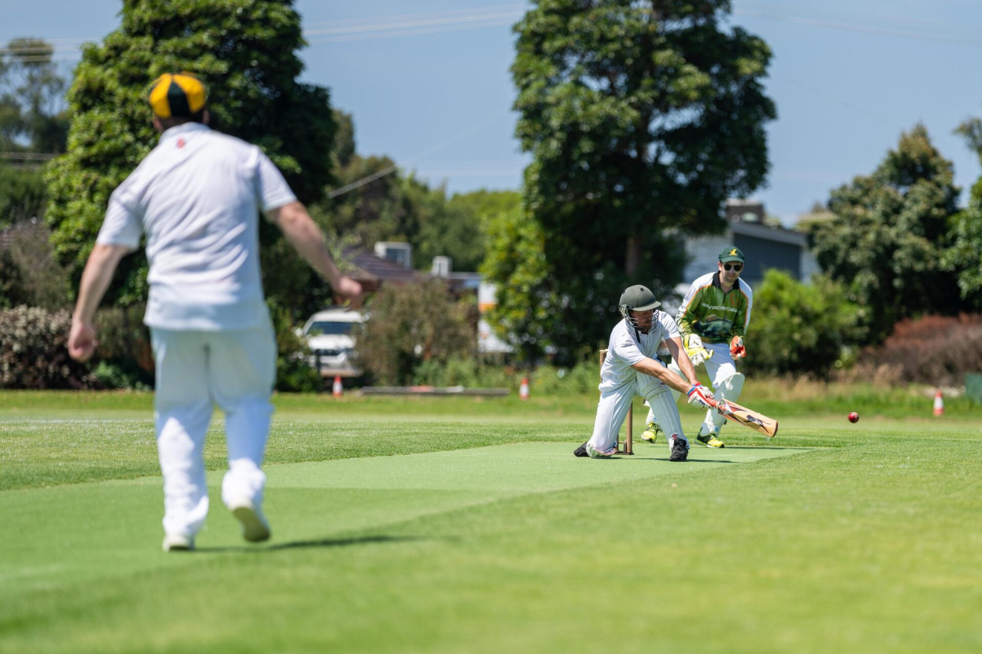 amateur game of local cricket match, cricket bat and bowl